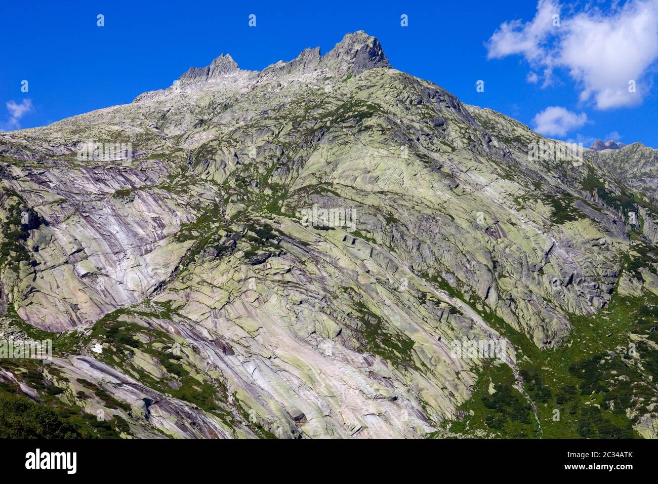 View of mountain peaks in spring time in switzerland stock photo alamy