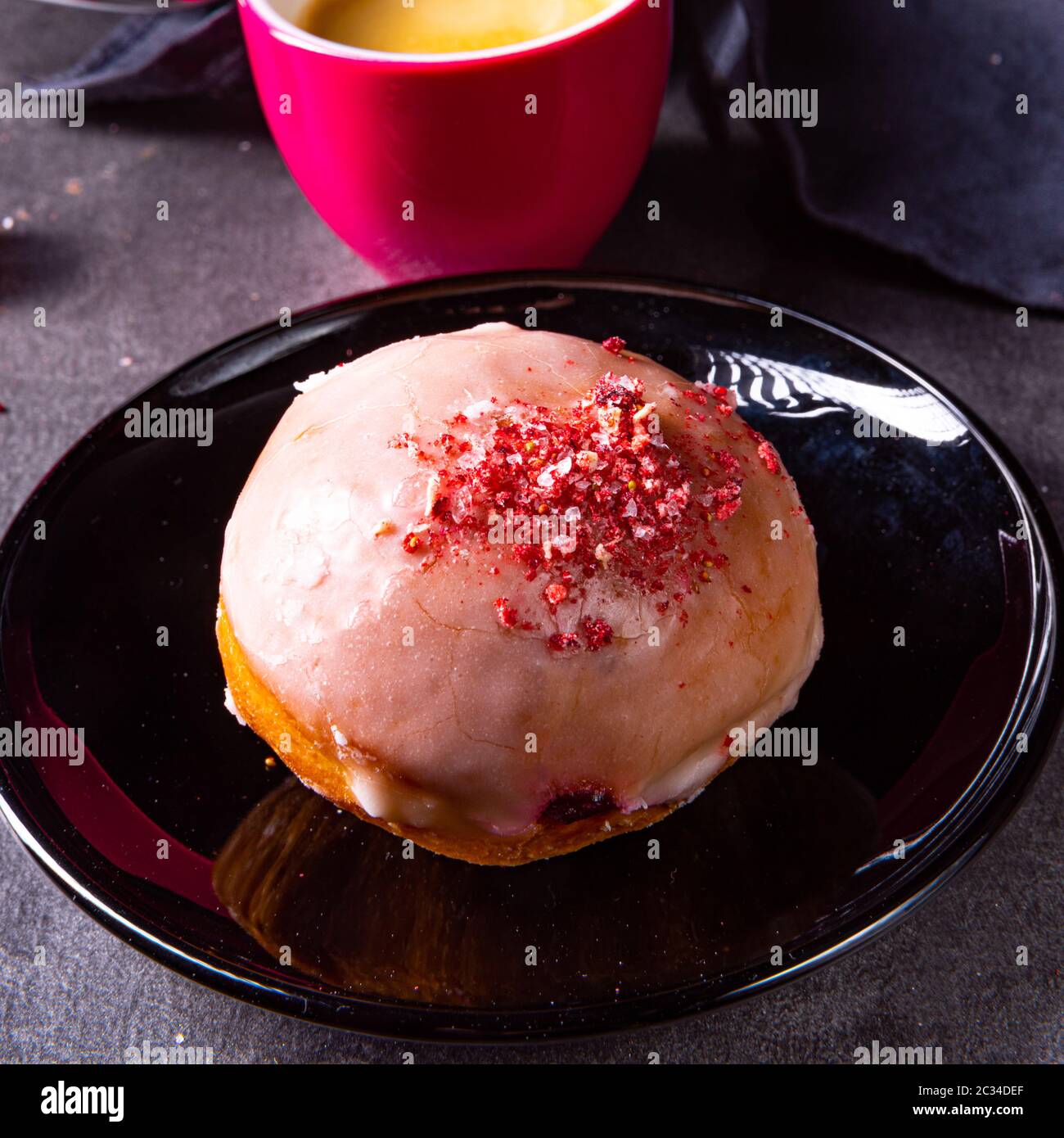 Delicious Berlin donuts filled with raspberry jam Stock Photo - Alamy
