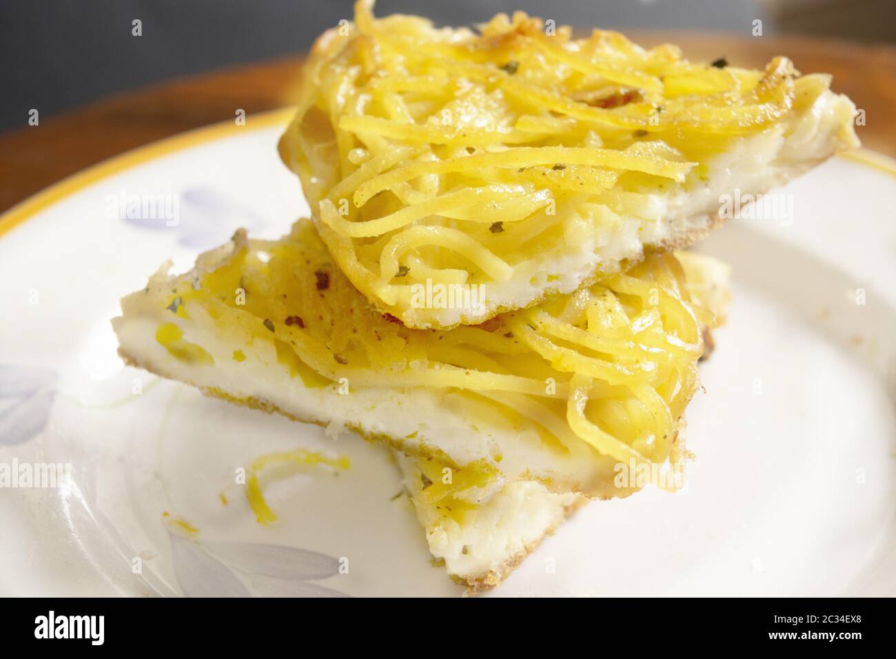 wedge of homemade omelette pasta in a dish Stock Photo