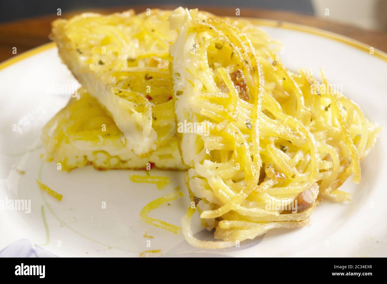 wedge of homemade omelette pasta in a dish Stock Photo