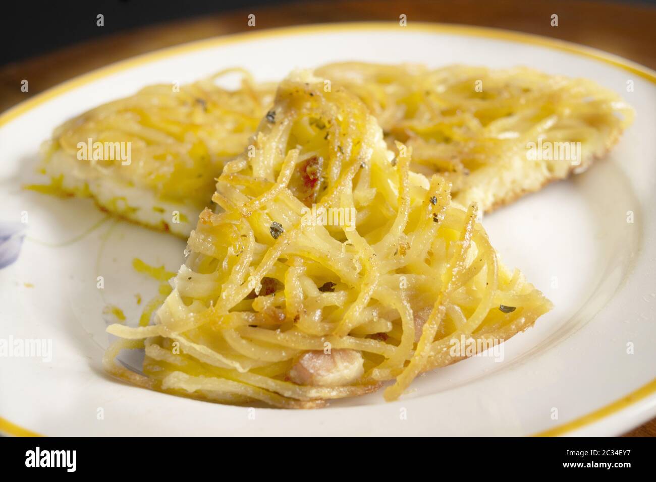 wedge of homemade omelette pasta in a dish Stock Photo