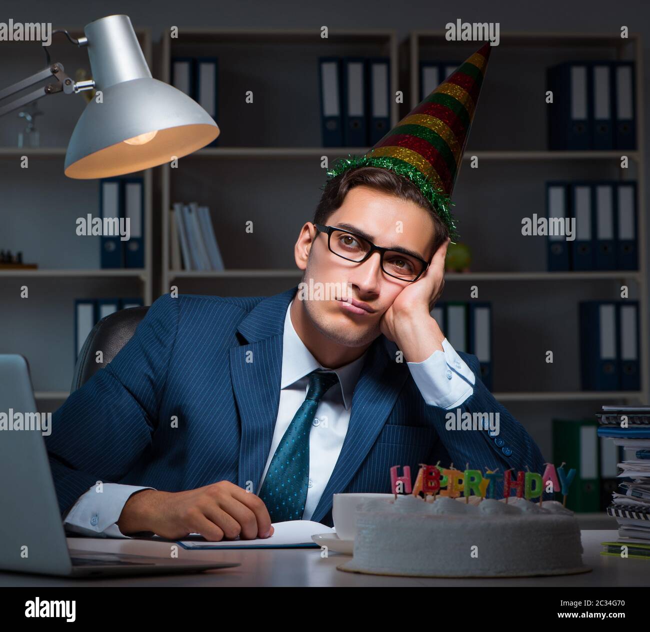 Man celebrating birthday in the office Stock Photo