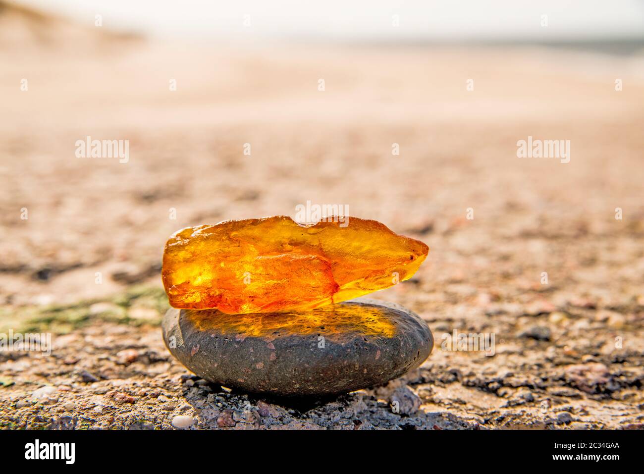 Amber stone on beach precious hi-res stock photography and images - Alamy