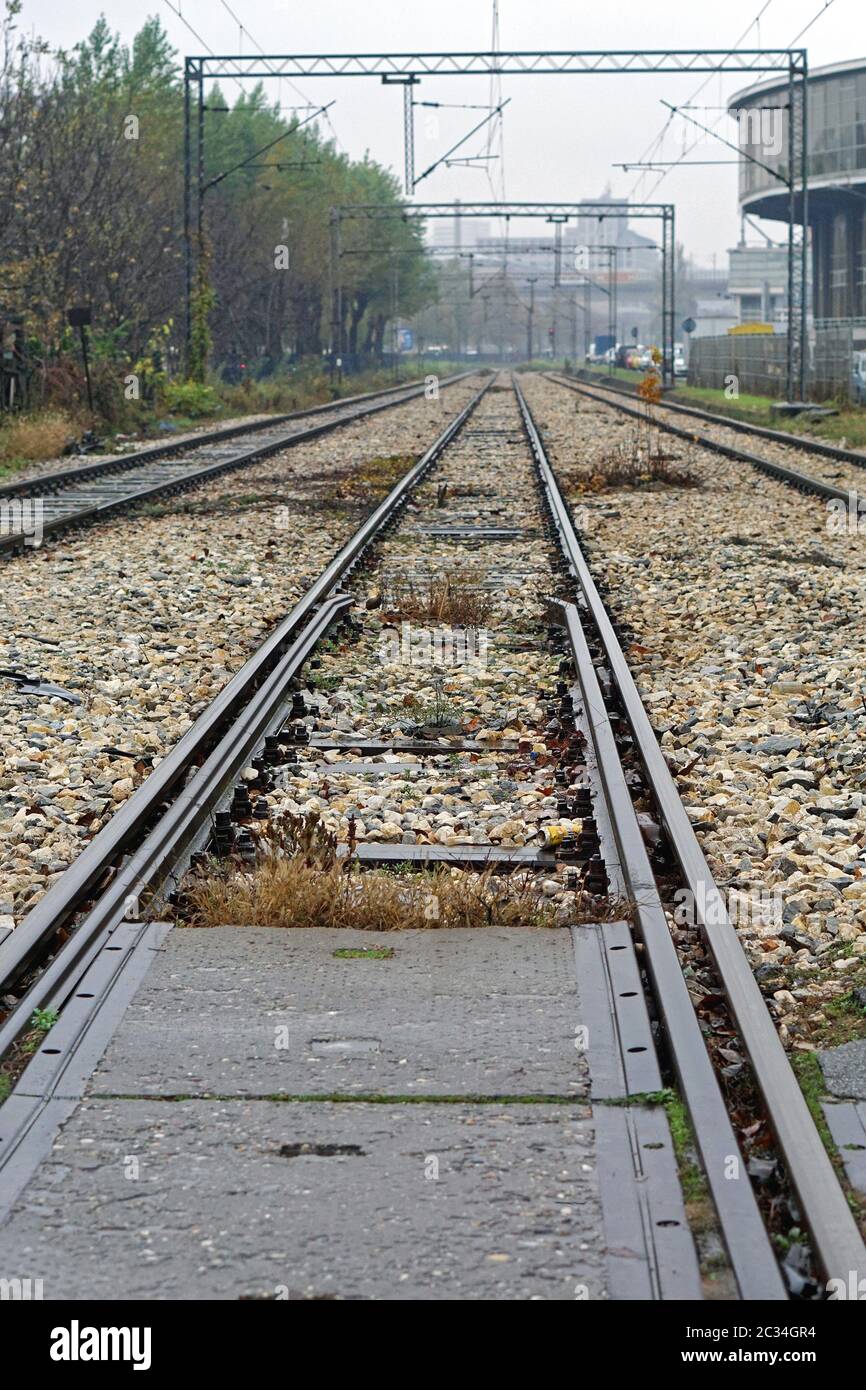 Triple Tracks Railway With Electric Lines Stock Photo Alamy