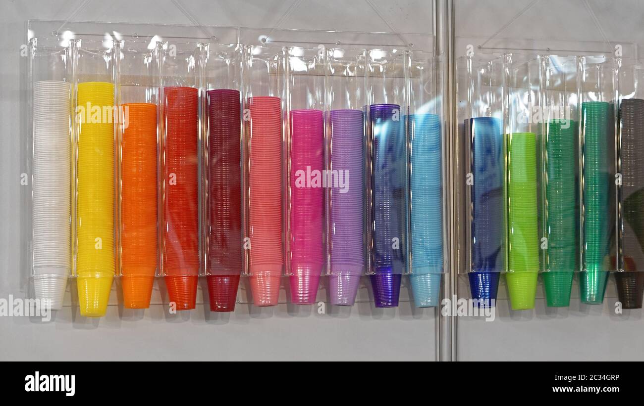 Plastic cups color in wall dispenser Stock Photo Alamy
