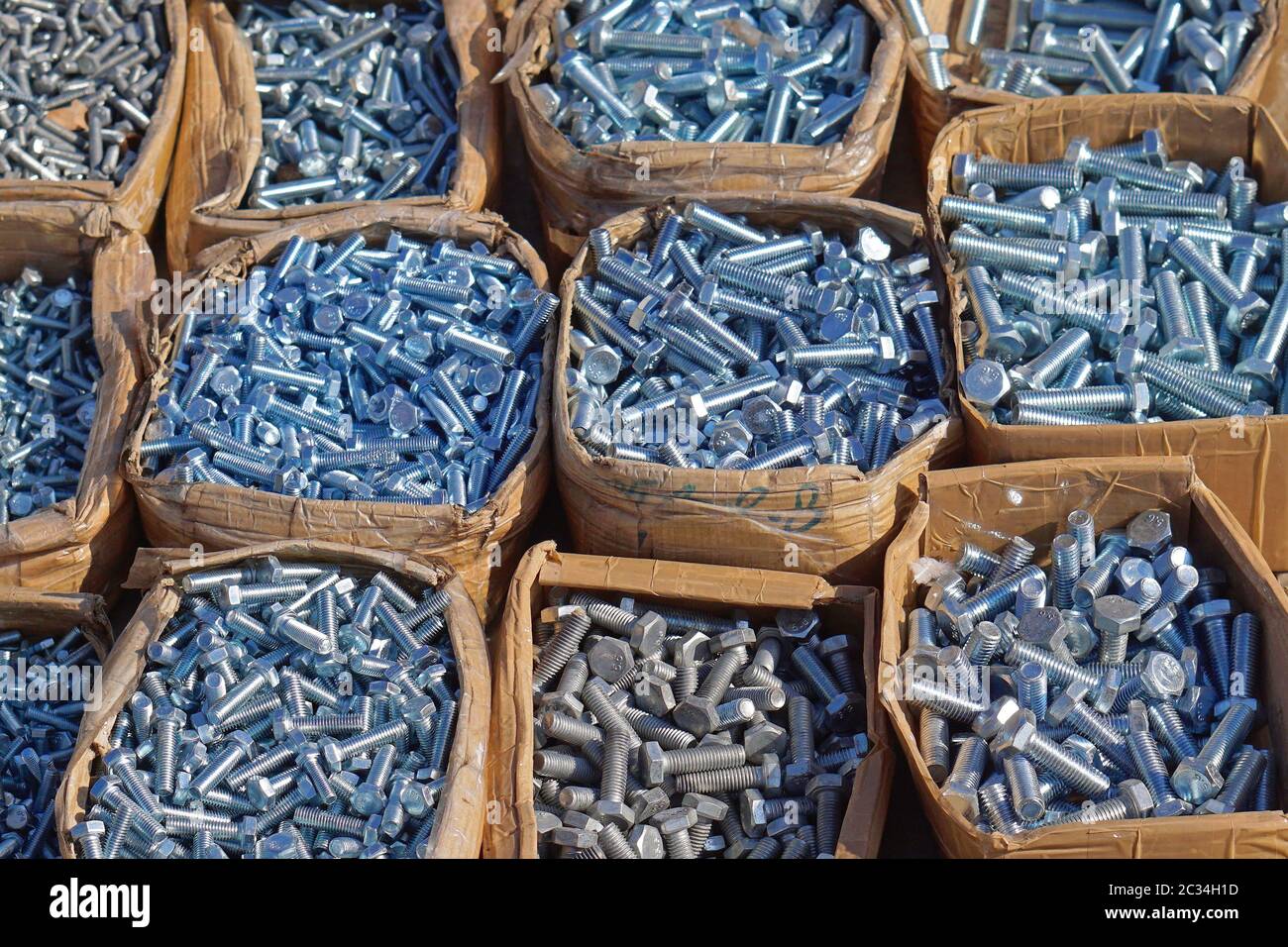 Bolts and nuts in boxes Stock Photo Alamy