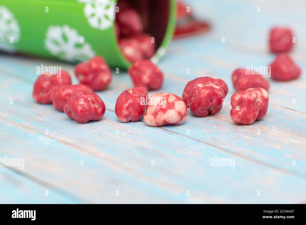 A jar full of bright colorful candies and candies Stock Photo