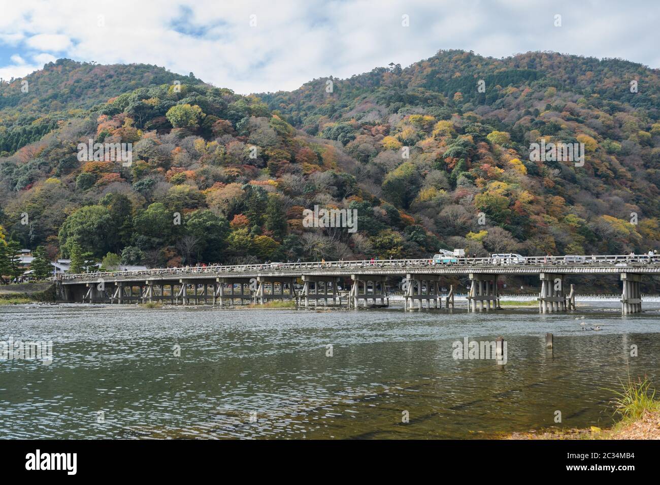 Togetsukyo bridge over Katsura river during autumn season in Arashiyama, Kyoto, Japan Stock Photo