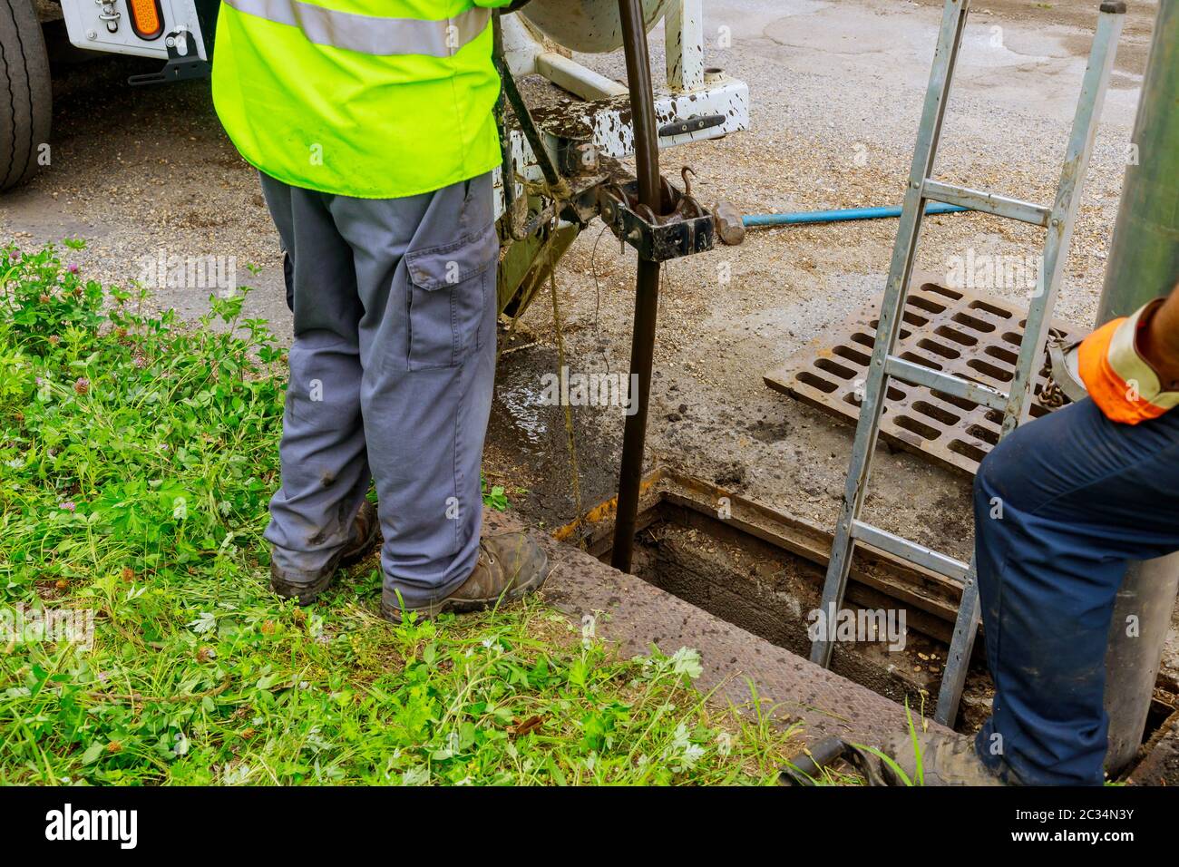 Cleaning the sewer system special equipment on utility service in the town. Stock Photo