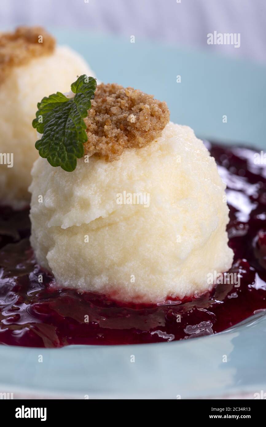 austrian curd noodles on plum sauce Stock Photo
