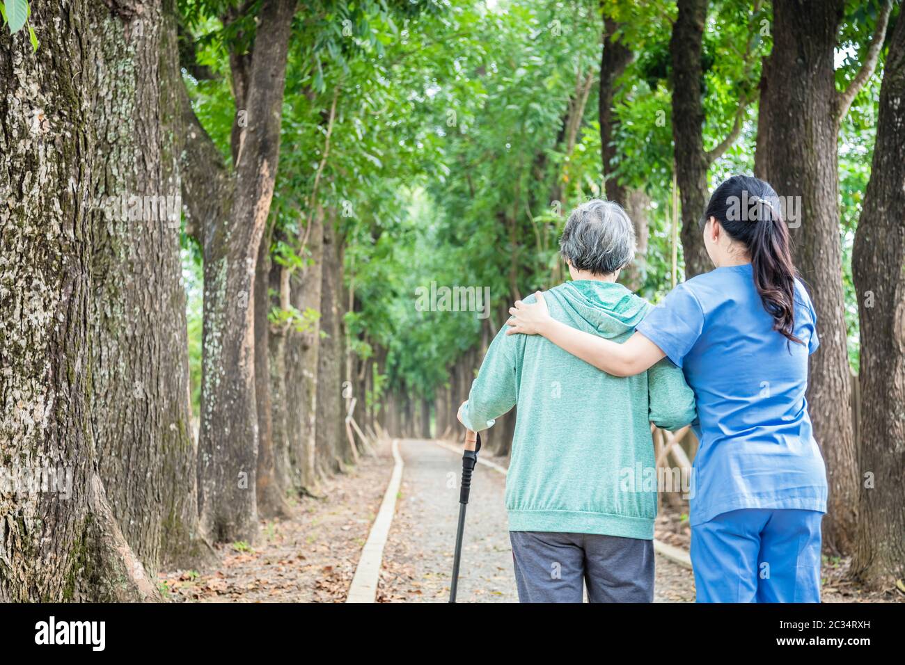 Helping old lady road hi-res stock photography and images - Alamy