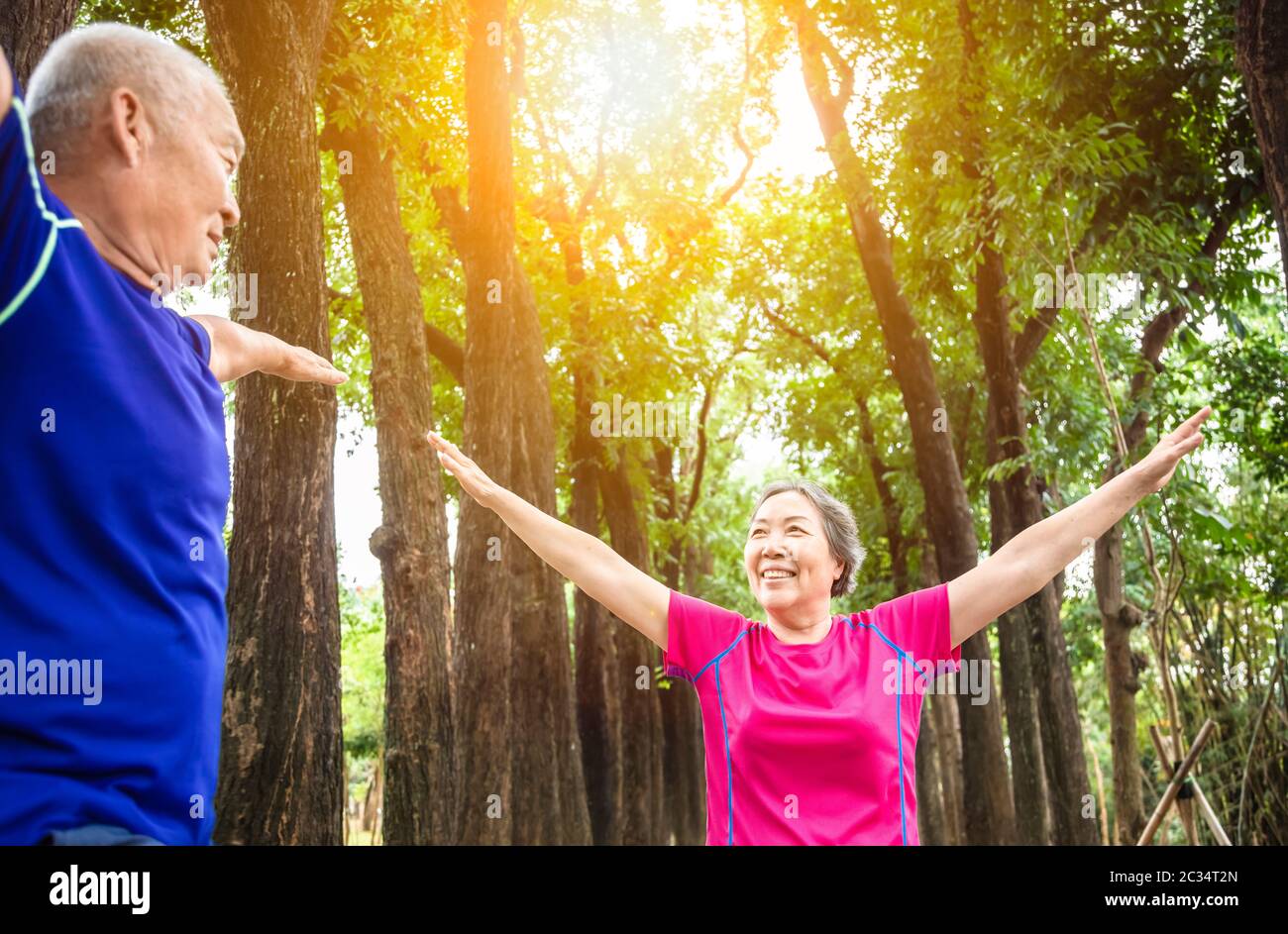 happy asian Senior couple exercising outdoors Stock Photo - Alamy