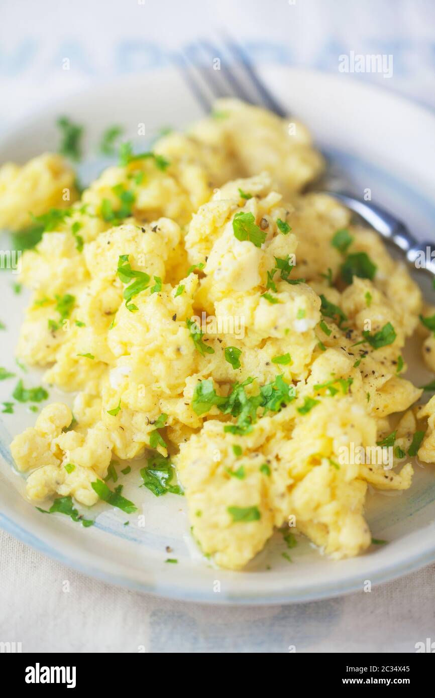 Plain Scrambled Eggs On A Plate Stock Photo