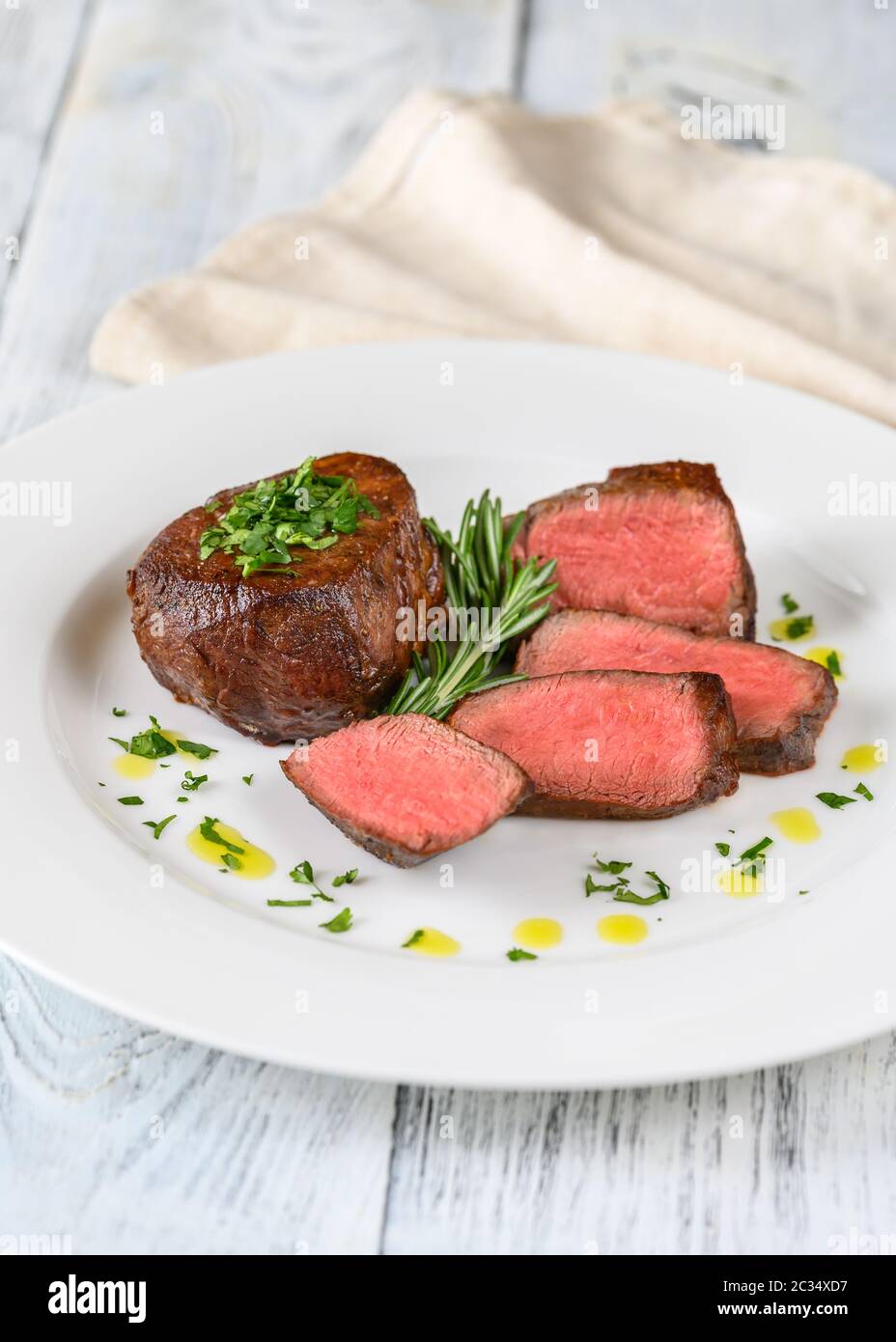 Filet mignon with frsh rosemary on the plate Stock Photo