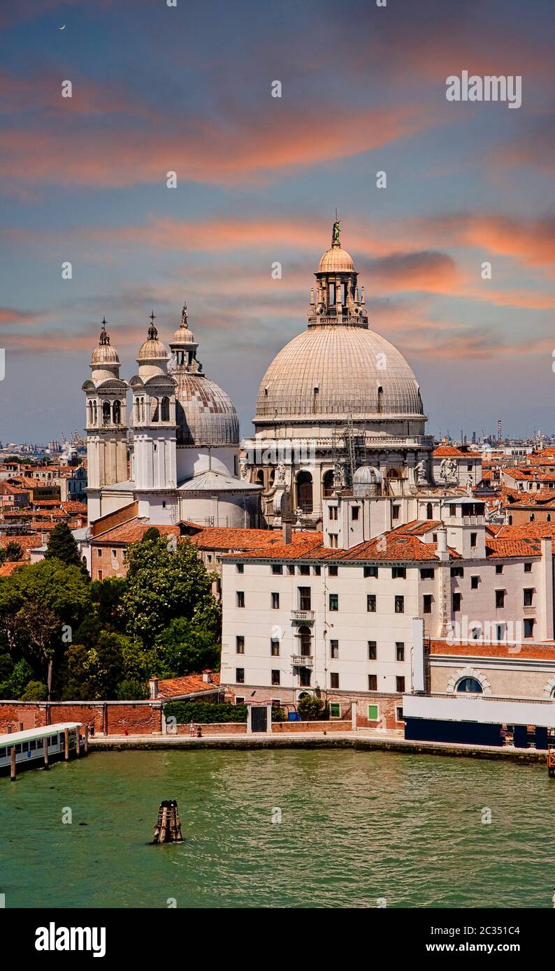 Church domes under cloudy skies in Venice, Italy Stock Photo - Alamy