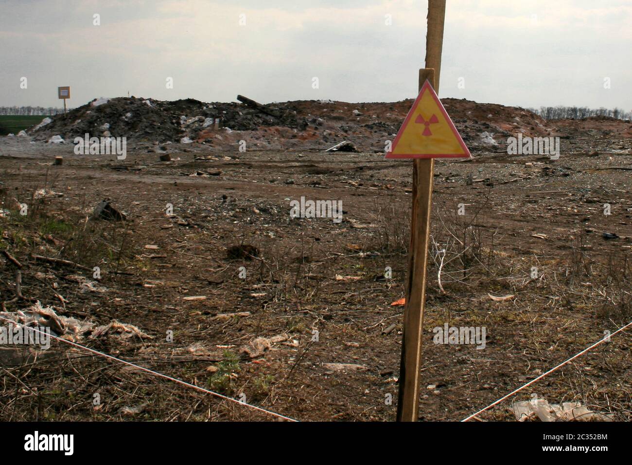 sign warning about the zone contaminated by radiation Stock Photo