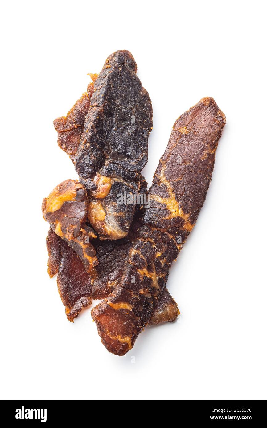 Beef jerky pieces. Dried beef meat isolated on white background Stock ...