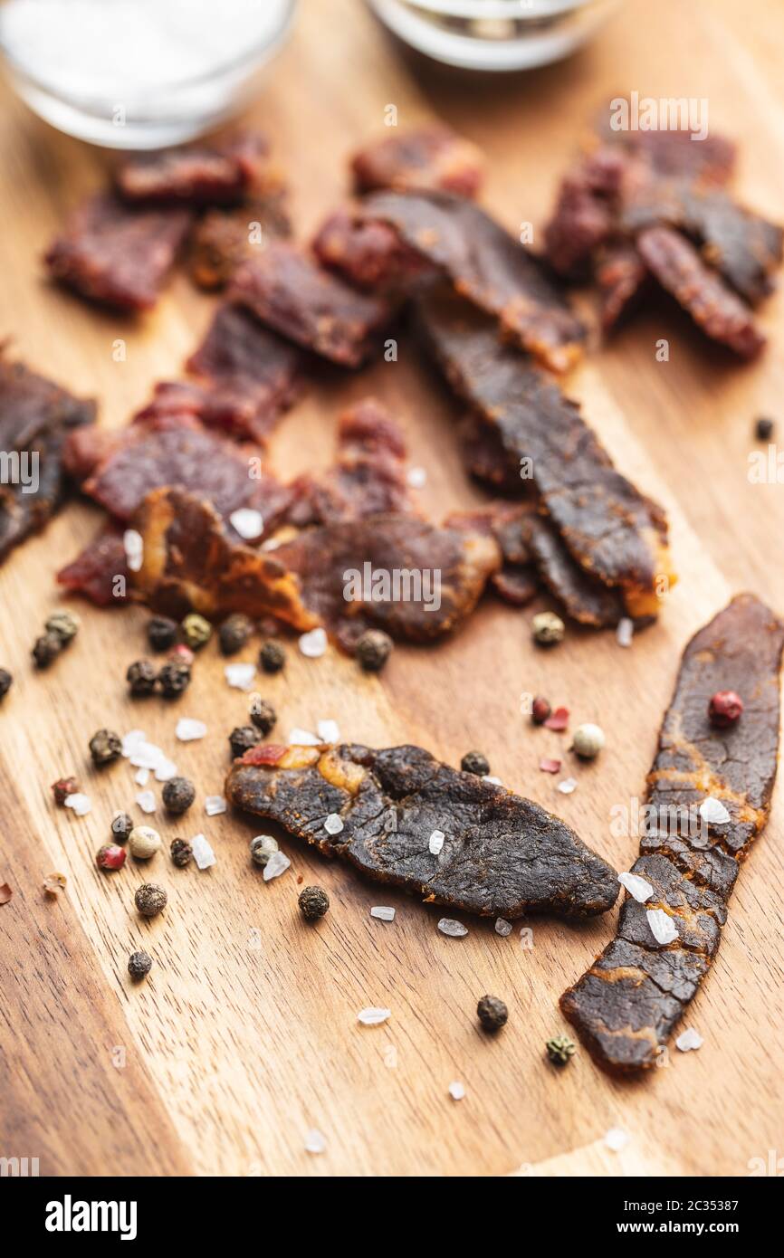 Beef jerky pieces with pepper and salt. Dried beef meat Stock Photo Alamy