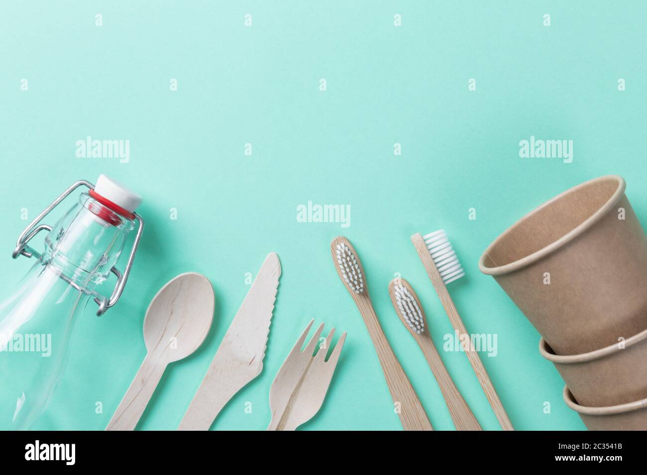 Sustainable eco friendly concept. Kitchenware on a teal background. Stock Photo