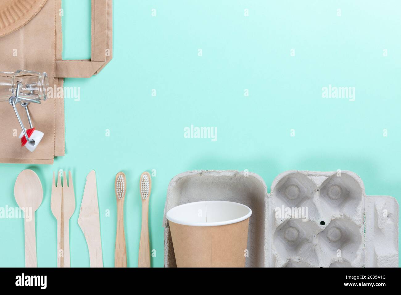 Sustainable eco friendly concept. Kitchenware on a teal background