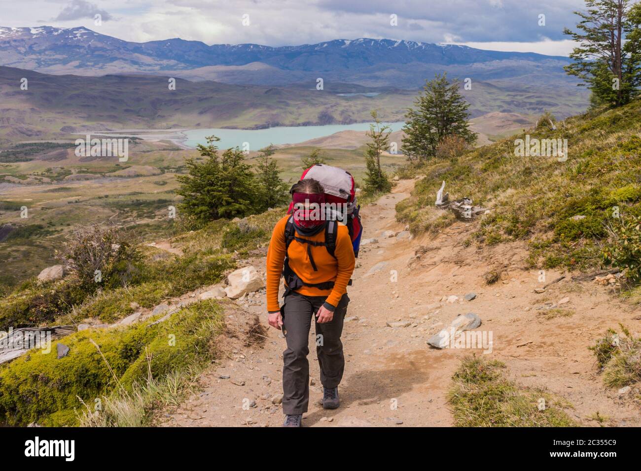Women trekking in Torres del Paine strong wind blo Stock Photo