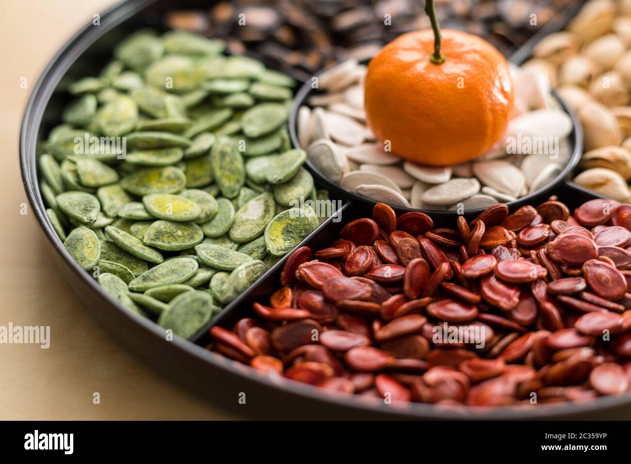 Traditional chinese snack tray for lunar new year celebration Stock
