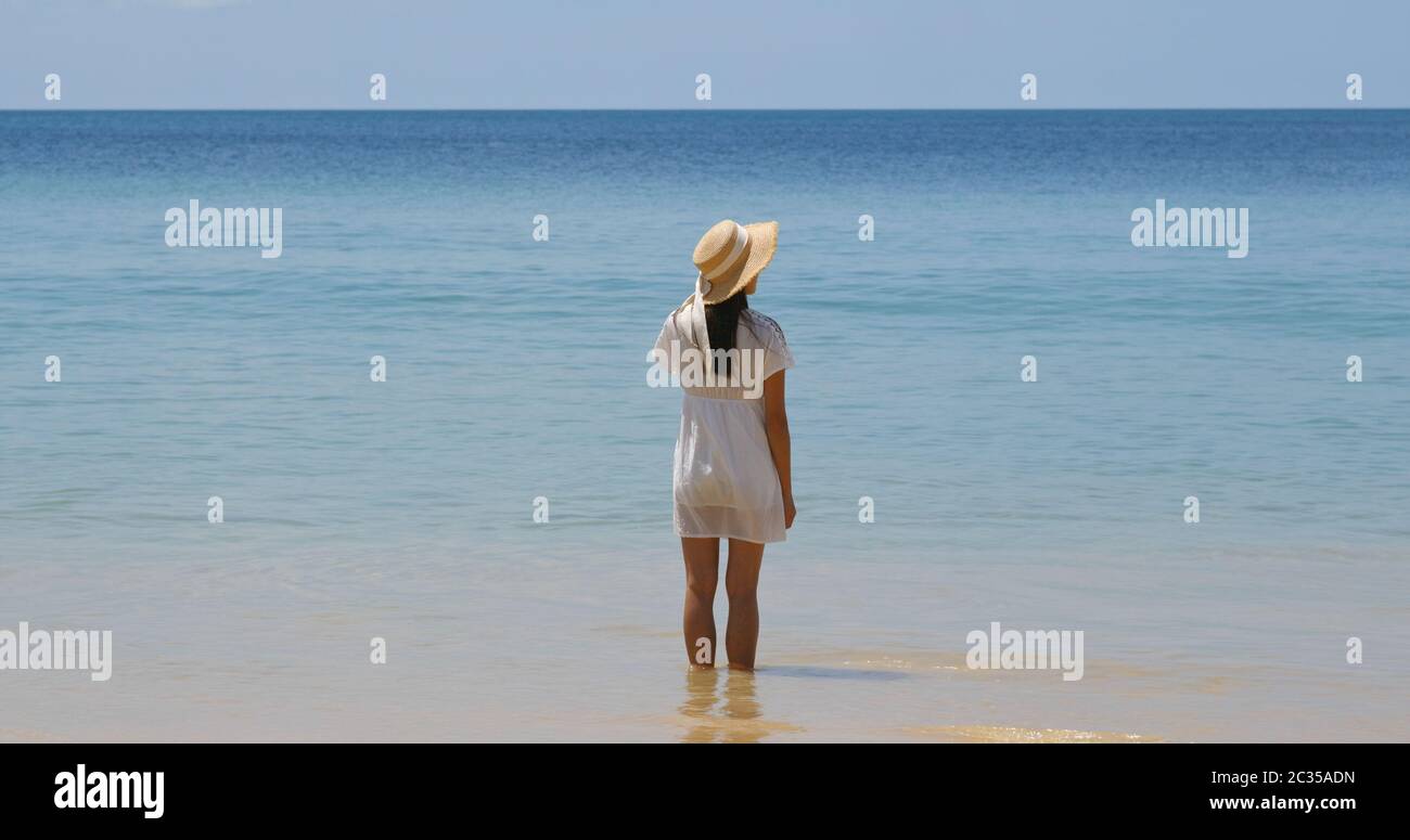 Woman look at the sea Stock Photo - Alamy