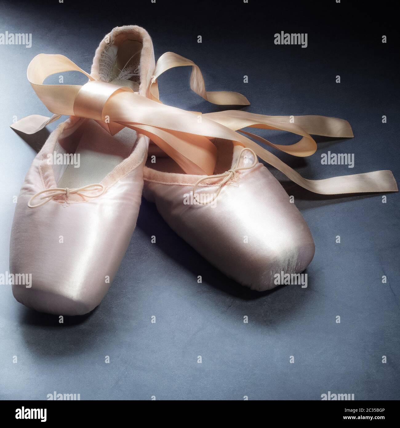 Pointe shoes ballet dance shoes with a bow of ribbons beautifully