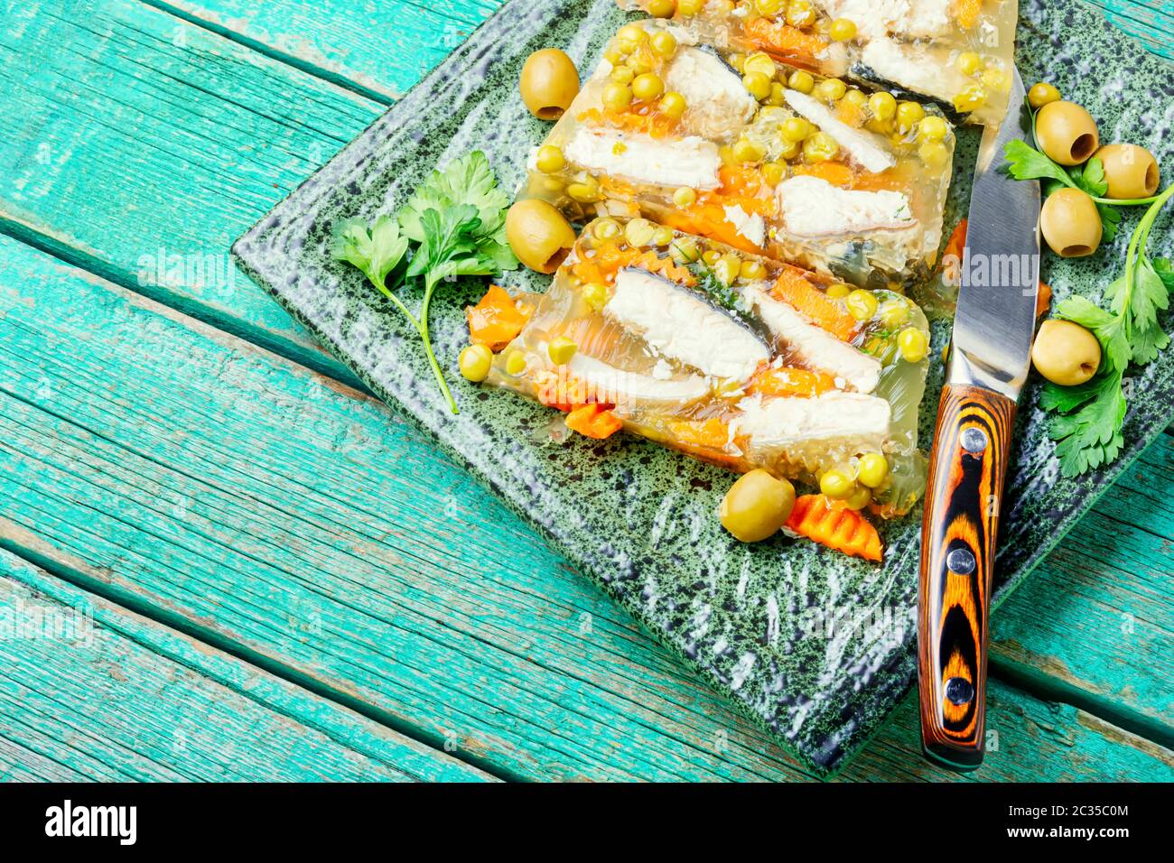Jellied, cold dish of fish, filled with gelatinous broth.Russian national cuisine Stock Photo