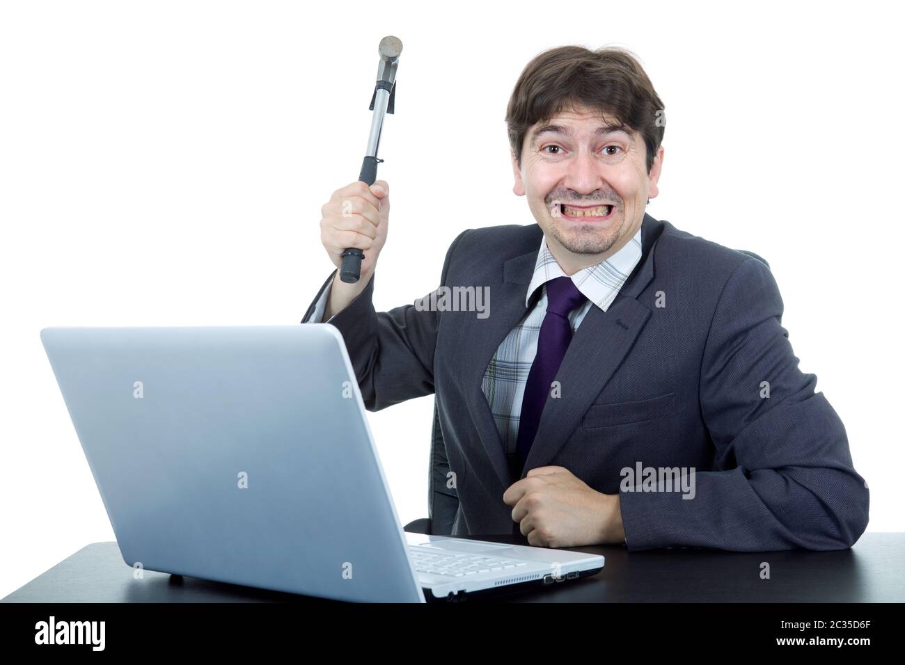Man smashing computer with hammer hires stock photography and images