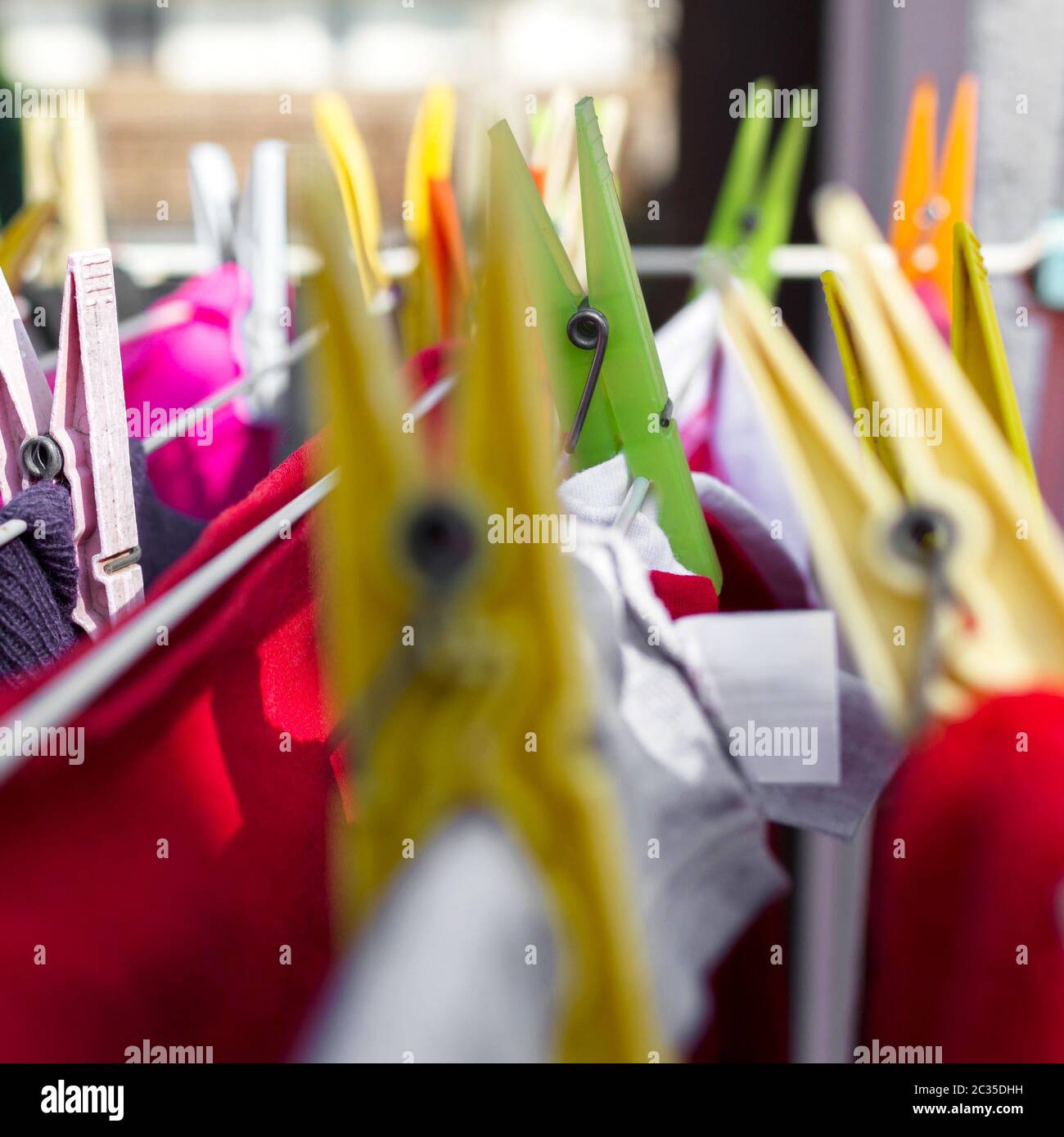 Colorful clothes pegs Stock Photo