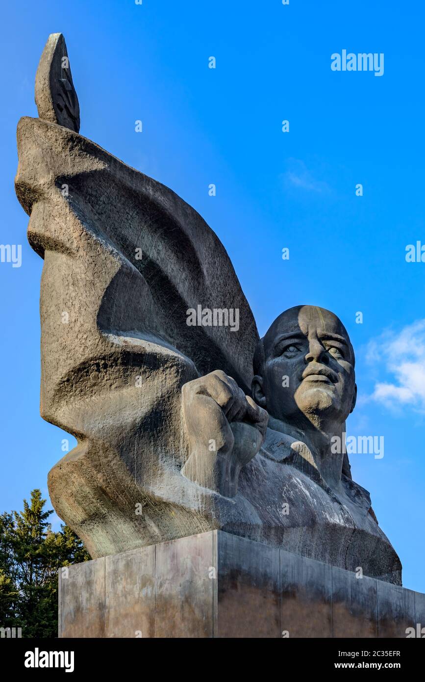 Socialist revolution art: Larger-than-life statue at Berlin Ernst Thälmann Park Stock Photo