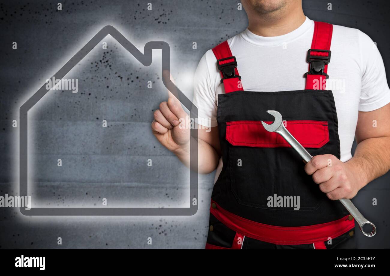 House concept touchscreen is operated by technician. Stock Photo