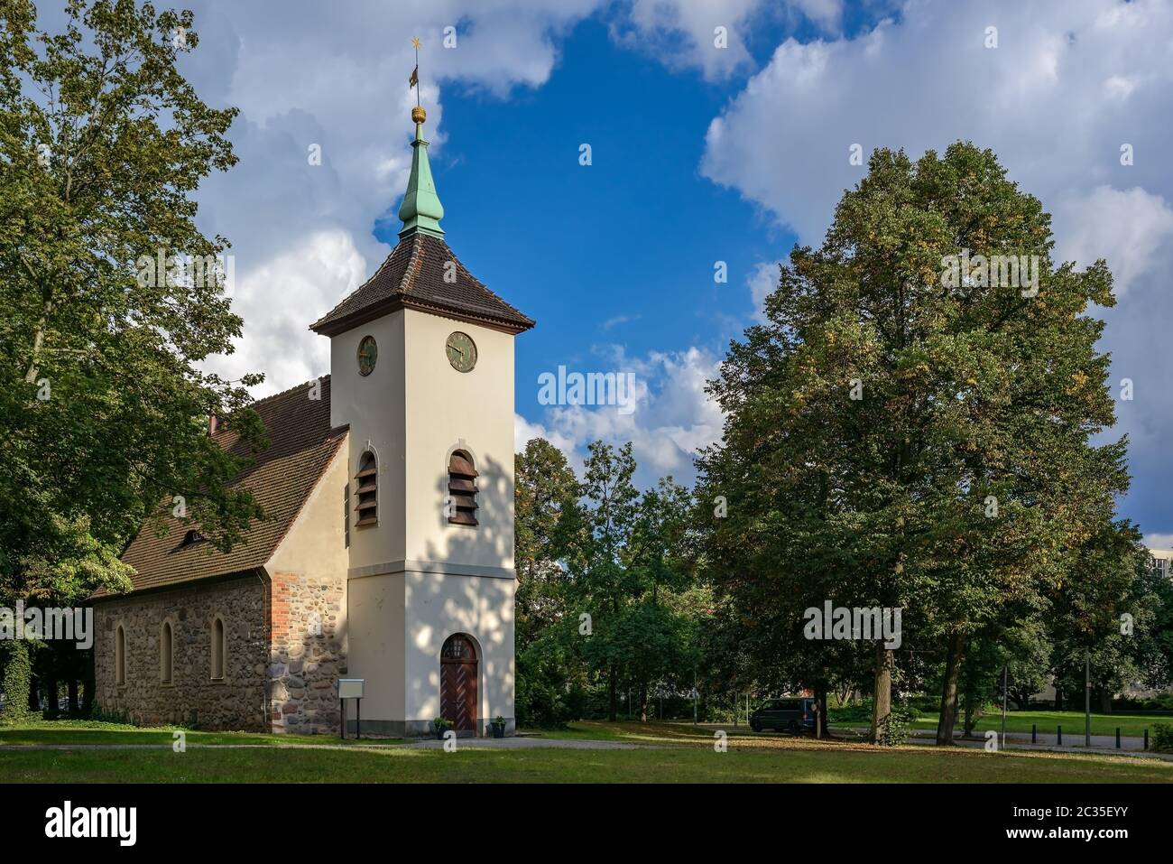 Village church and green in Berlin-Reinickendorf (View from the West) Stock Photo