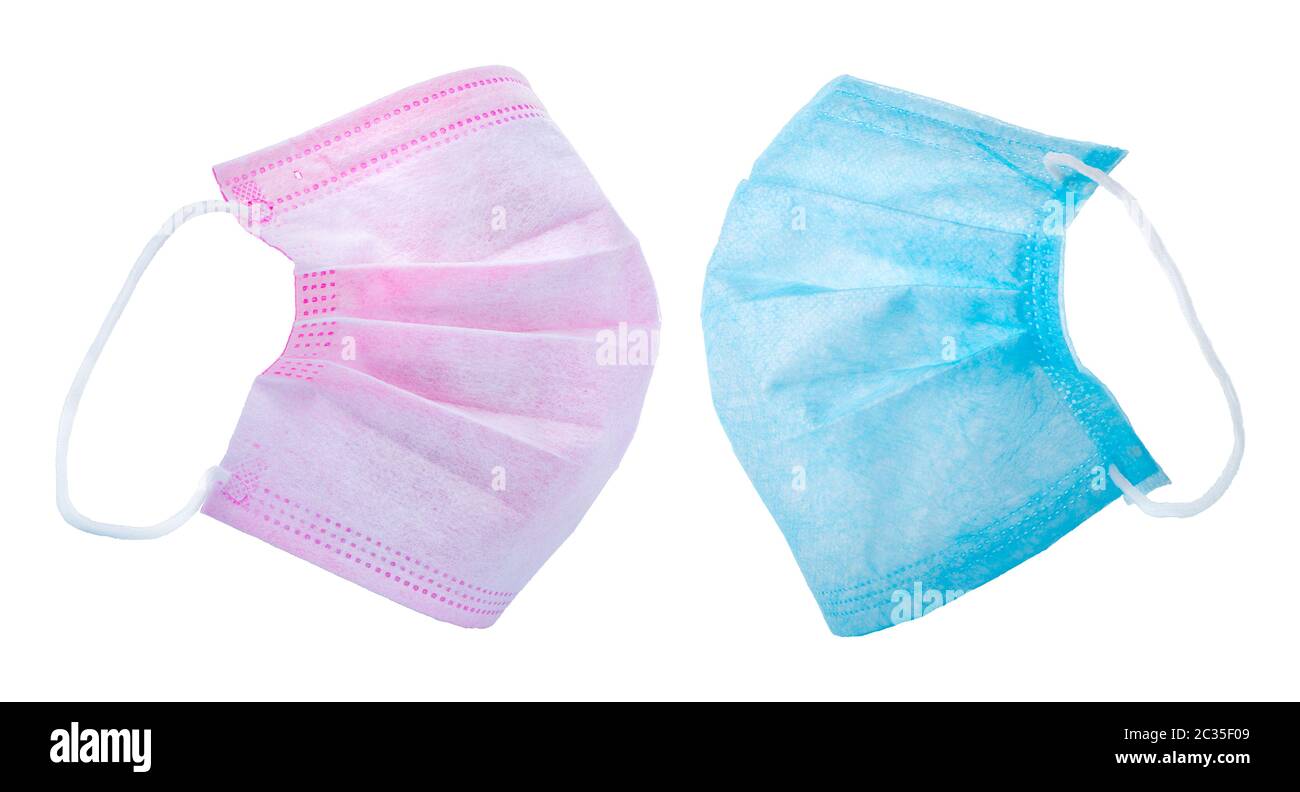 Two medical masks isolated on a white background Stock Photo - Alamy