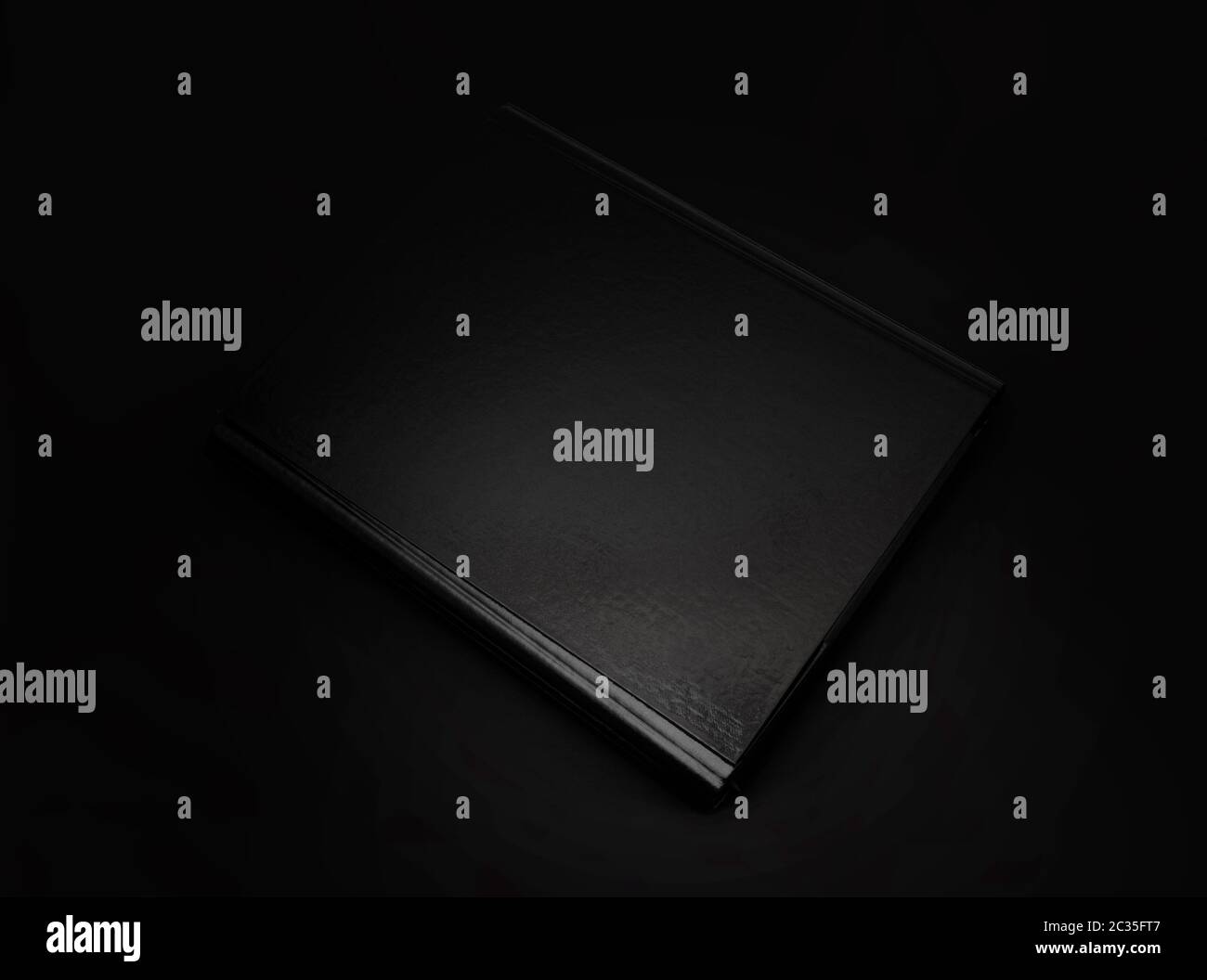Black leather folder isolated on black background. With clipping path Stock Photo