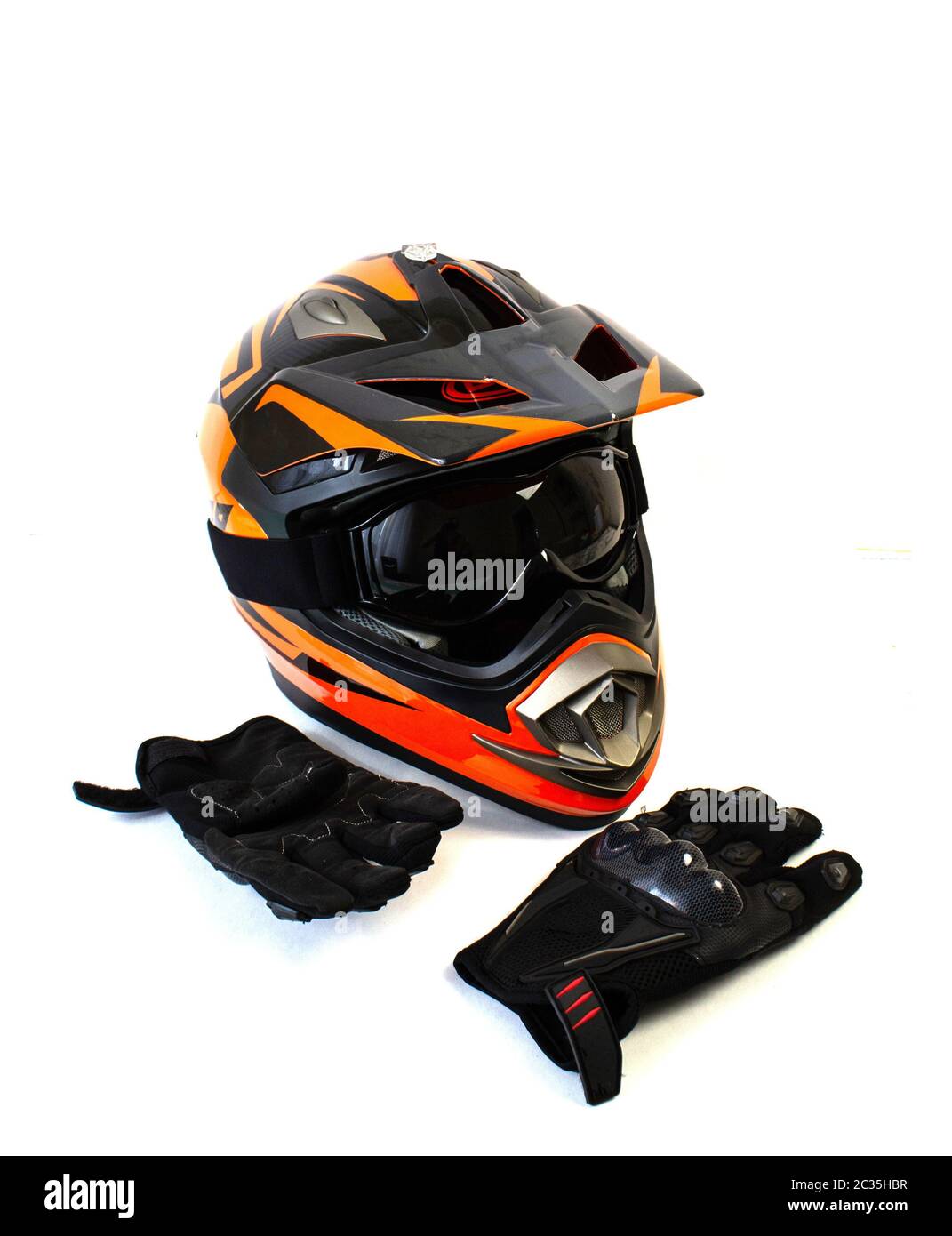 isolated on a white background motorcycle helmet and biker gloves Stock Photo