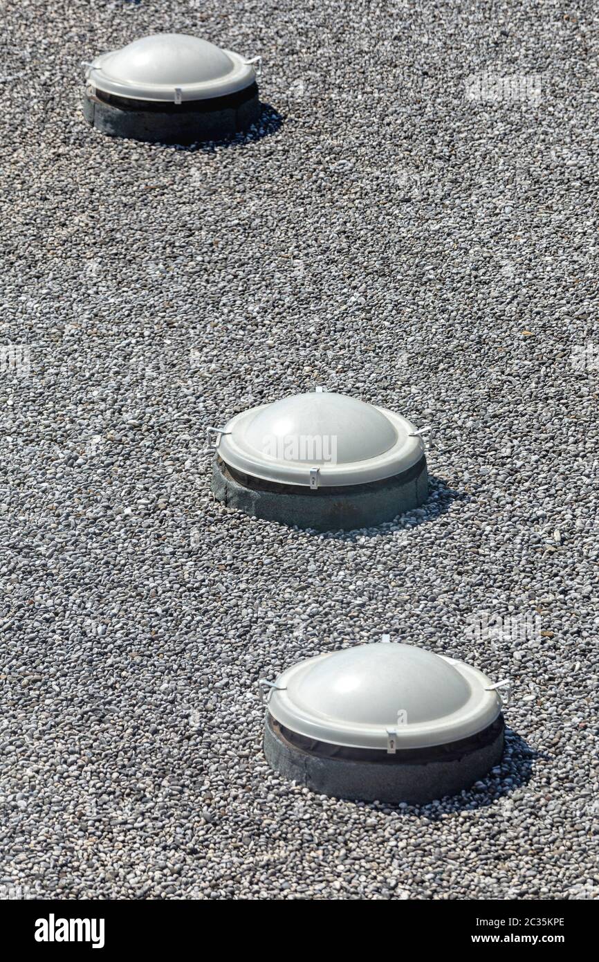 Skylight Windows at Gravel Flat Roof Building Stock Photo Alamy