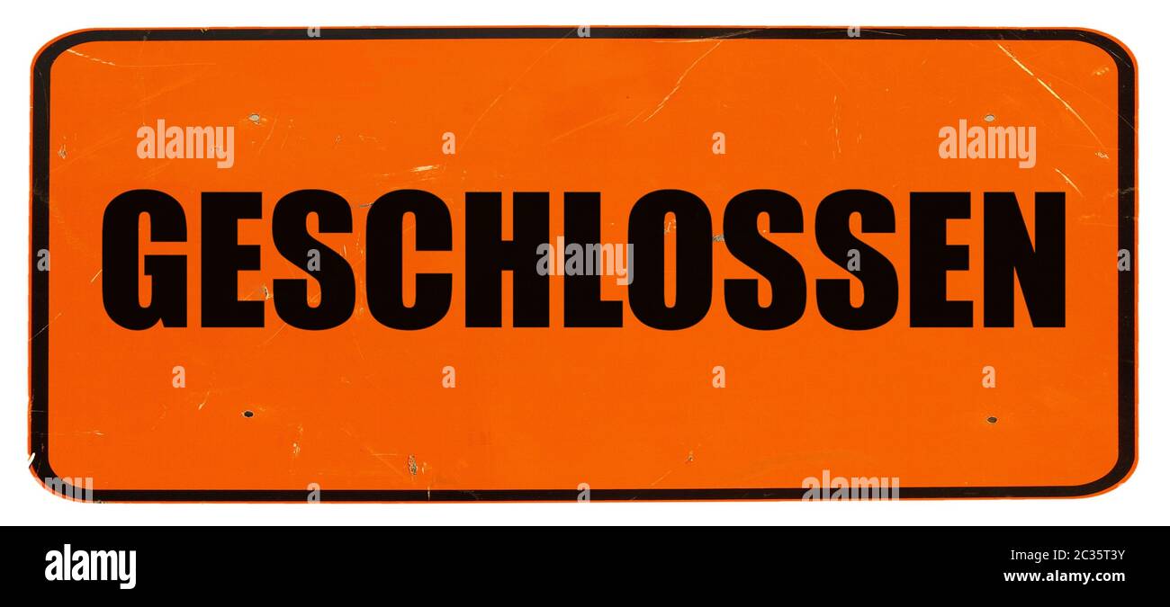 Geschlossen (translation: Closed) sign a in shop window isolated over white Stock Photo