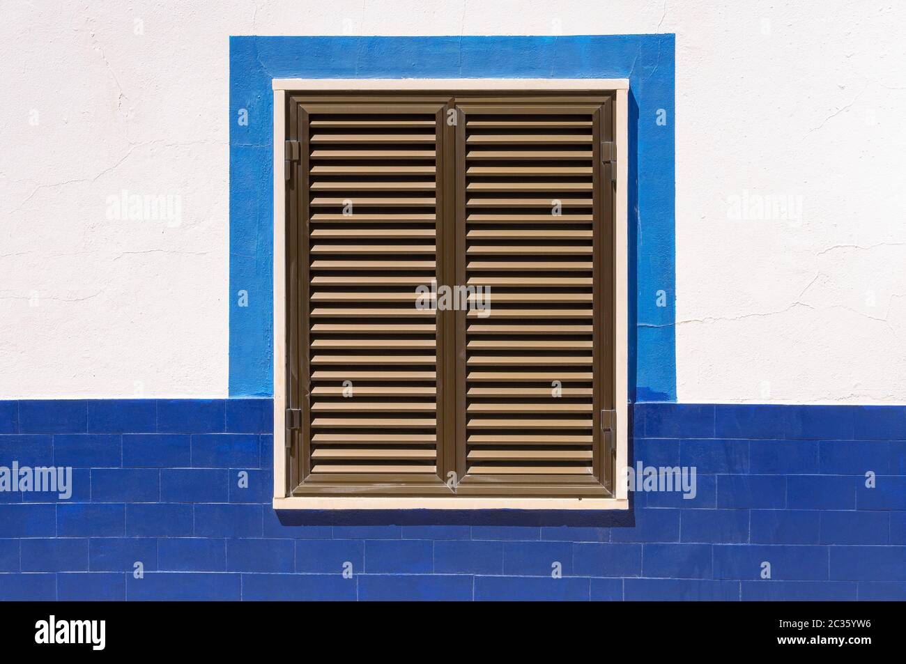 Closed wooden window shutters of an typical mediterranean house Stock ...