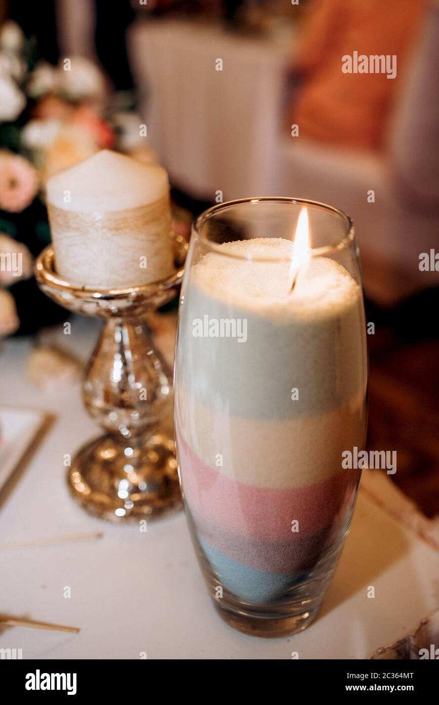 bulk candle a vase with layered colored sand Stock Photo Alamy