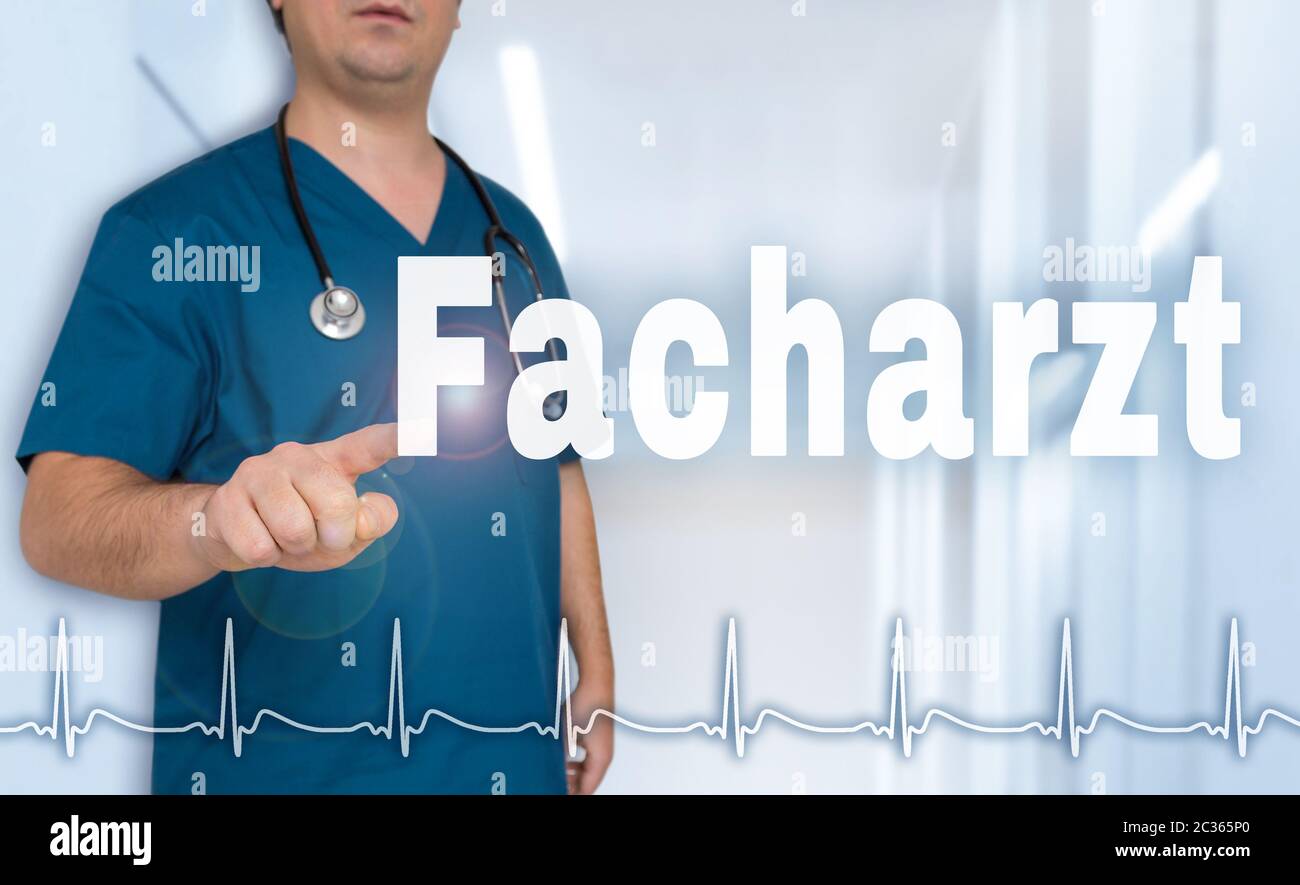 Facharzt (in german Specialist doctor) pointing at viewer with heart rate concept. Stock Photo