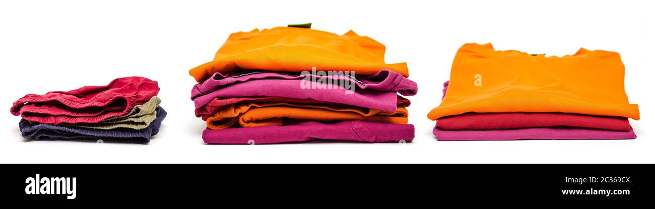 Unterhosen, T-Shirt und Pullower im Querformat als Freisteller weiss Stock Photo