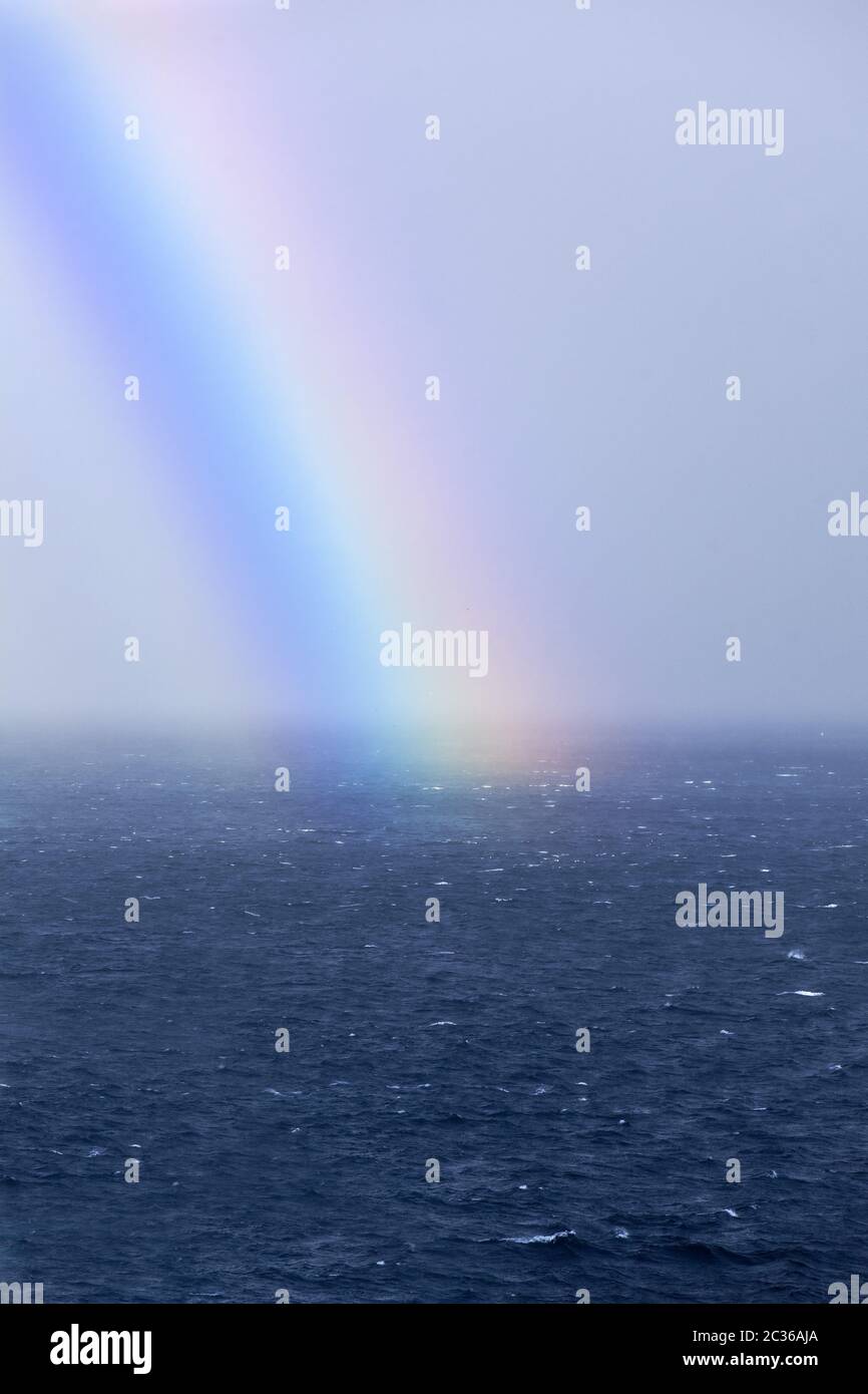 Rainbow on the sea, Atlantic, Faeroeer, Føroyar, Denmark, Europe Stock Photo