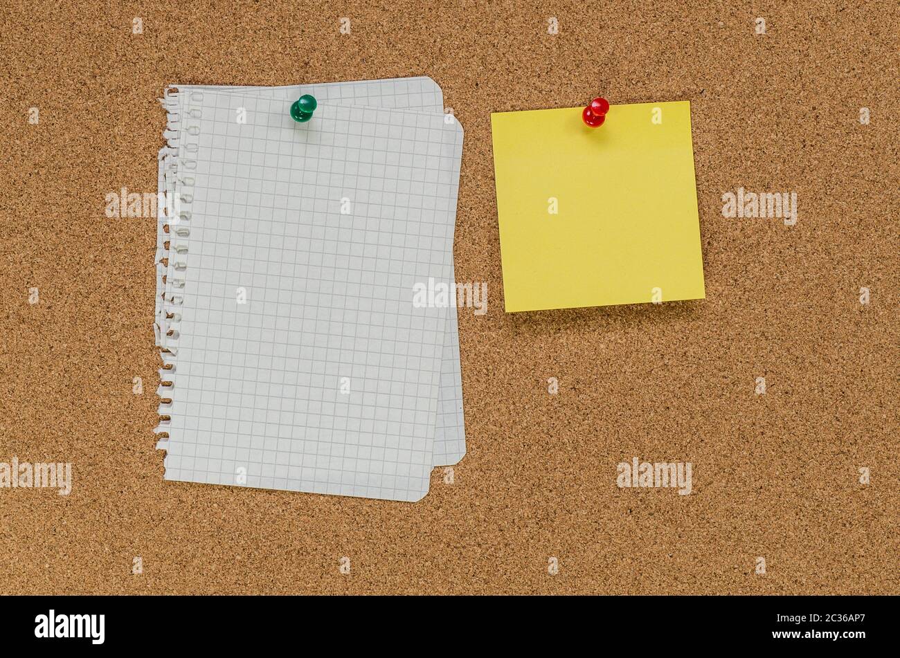Cork board and note papers, close up image Stock Photo