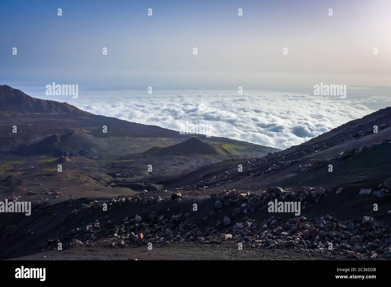 Cha das Caldeiras over the clouds view from Pico do Fogo in Cape Verde ...