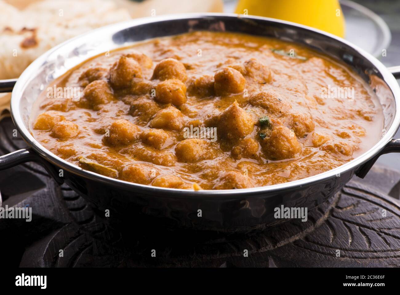 Chana Masala Traditional Indian dish with chickpeas and curry Stock