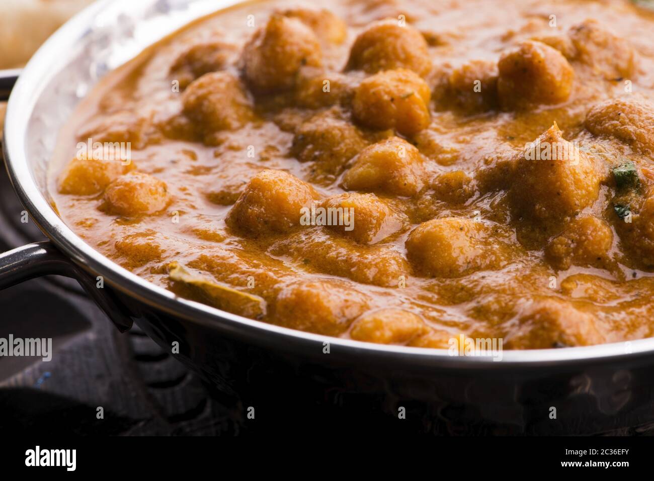 Chana Masala Traditional Indian dish with chickpeas and curry Stock