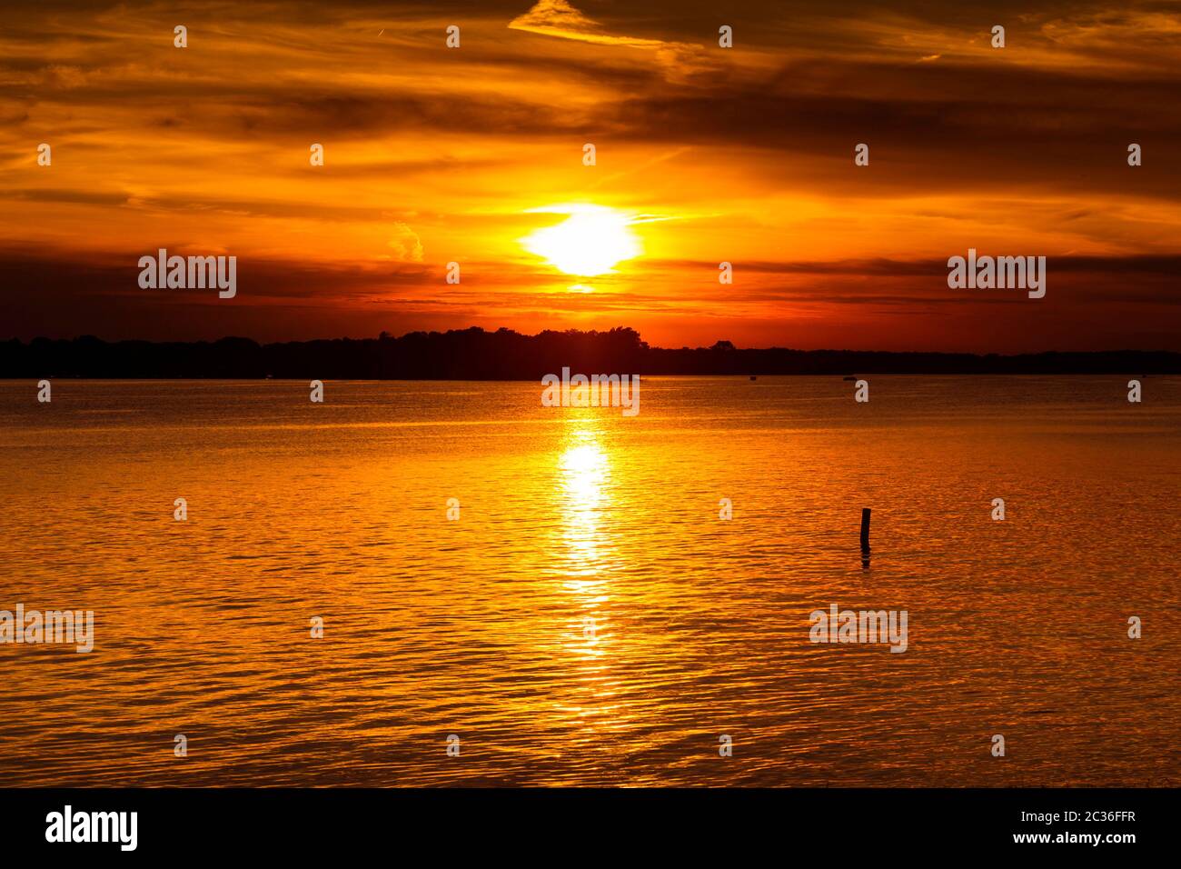 Sunset Over a Lake Stock Photo