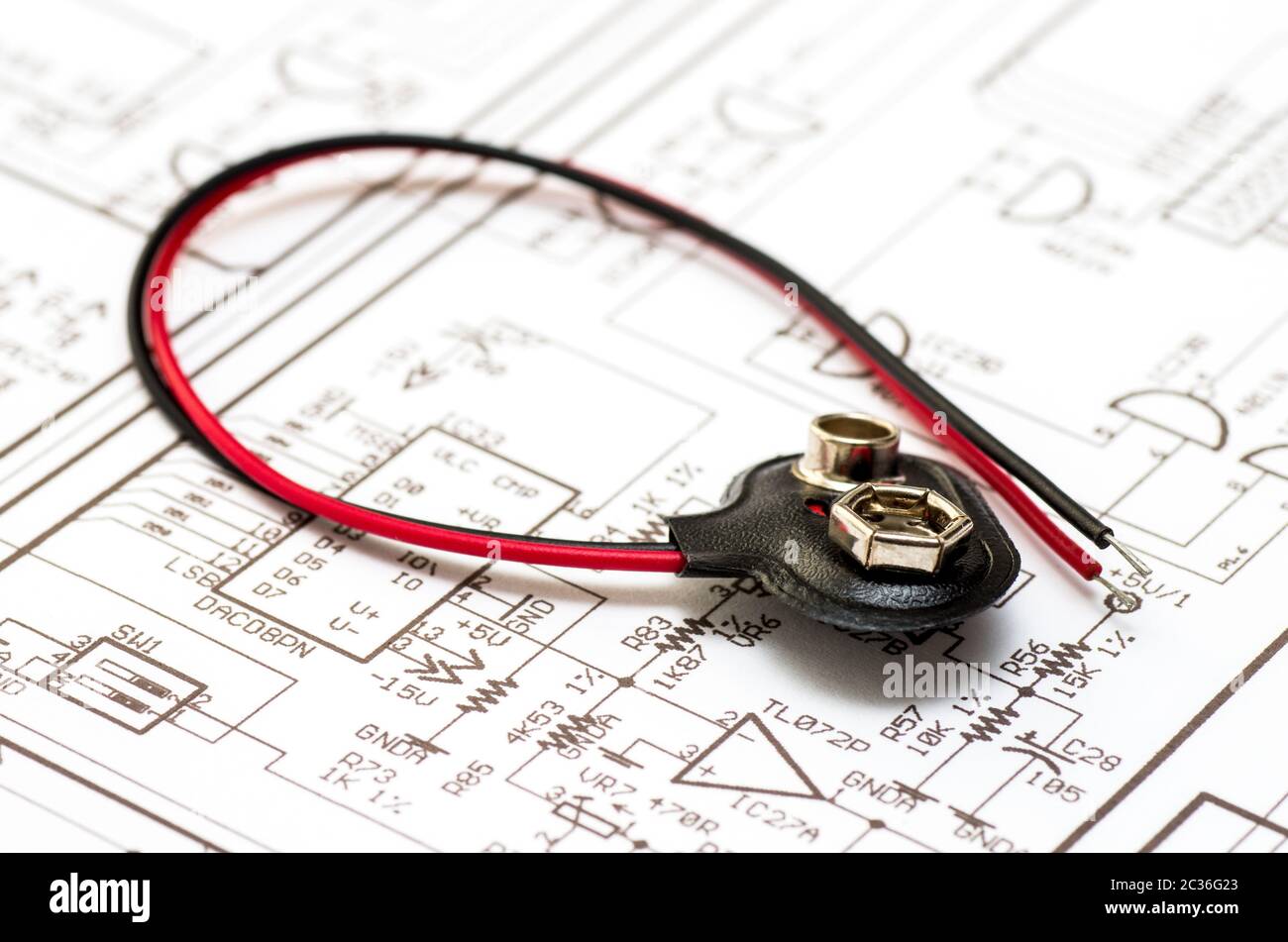 Battery connector placed on the printed drawing Stock Photo